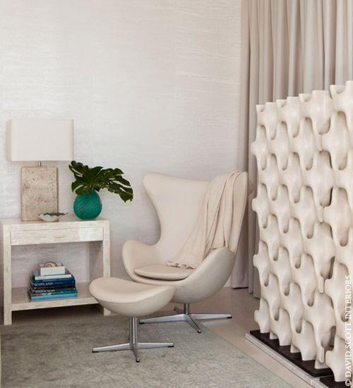 Egg chair de Arne Jacobsen, con reposapiés