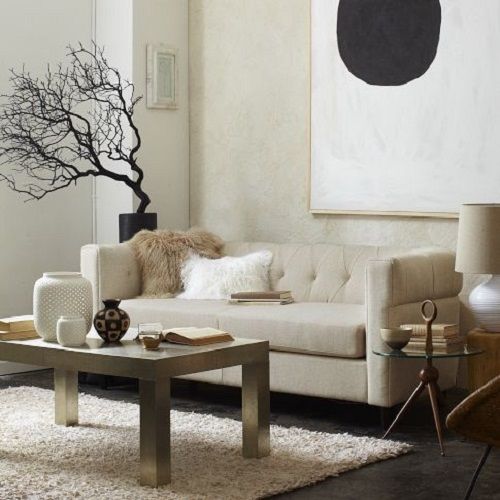 Sofa integrado con el color de la pared